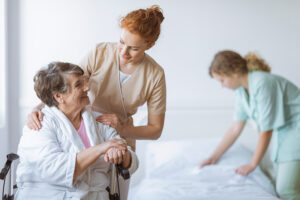 senior lady with caregivers