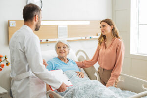 Woman talking with the doctor to advocate for a loved one while in the hospital